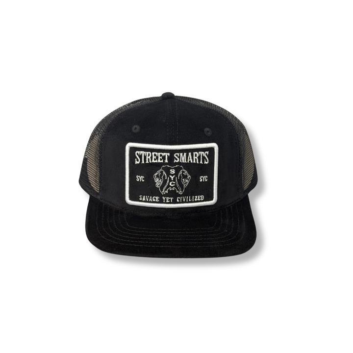 Black Street Smarts Corduroy Trucker Hat with paisley design and suede brim, adjustable snapback closure